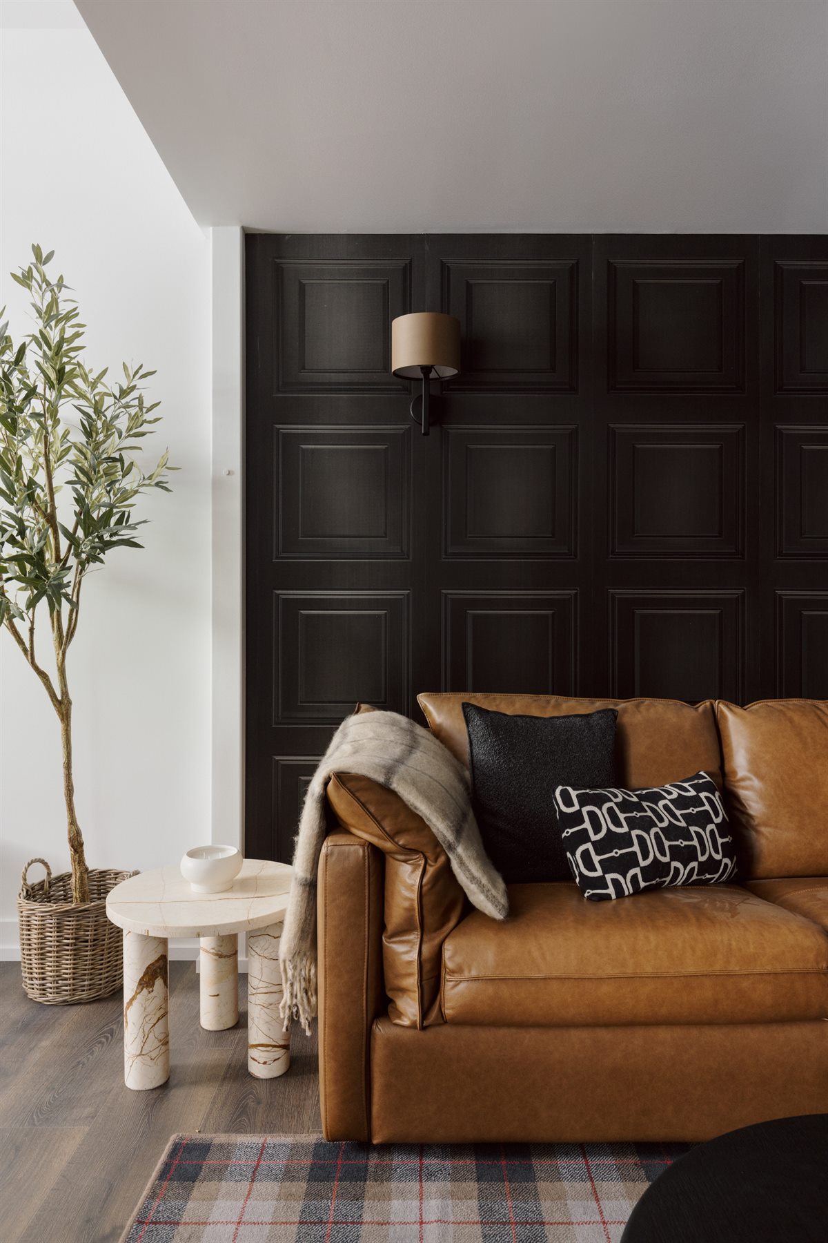The Stables living room with leather sofa